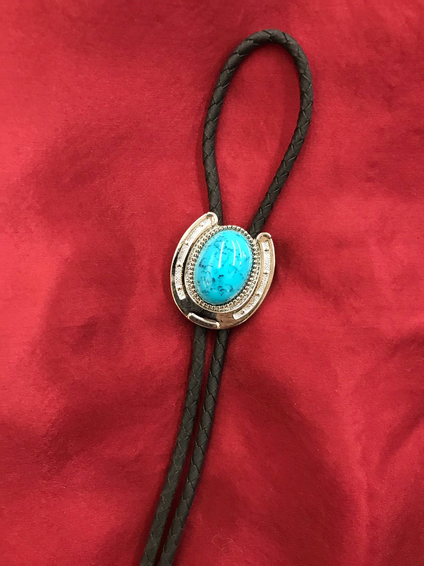 HORSESHOE BOLO TIE W/ TURQUOISE STONE