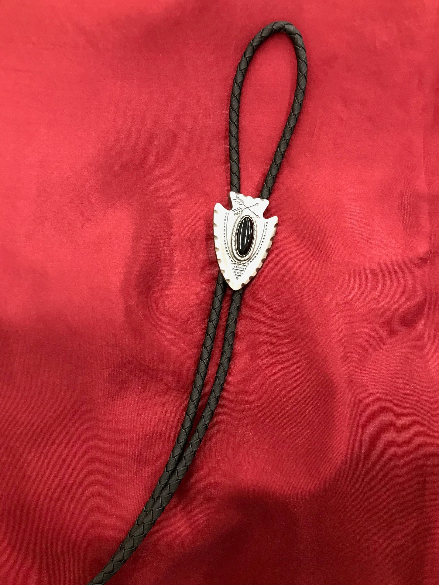 SILVER ARROWHEAD BOLO W/ BLACK STONE