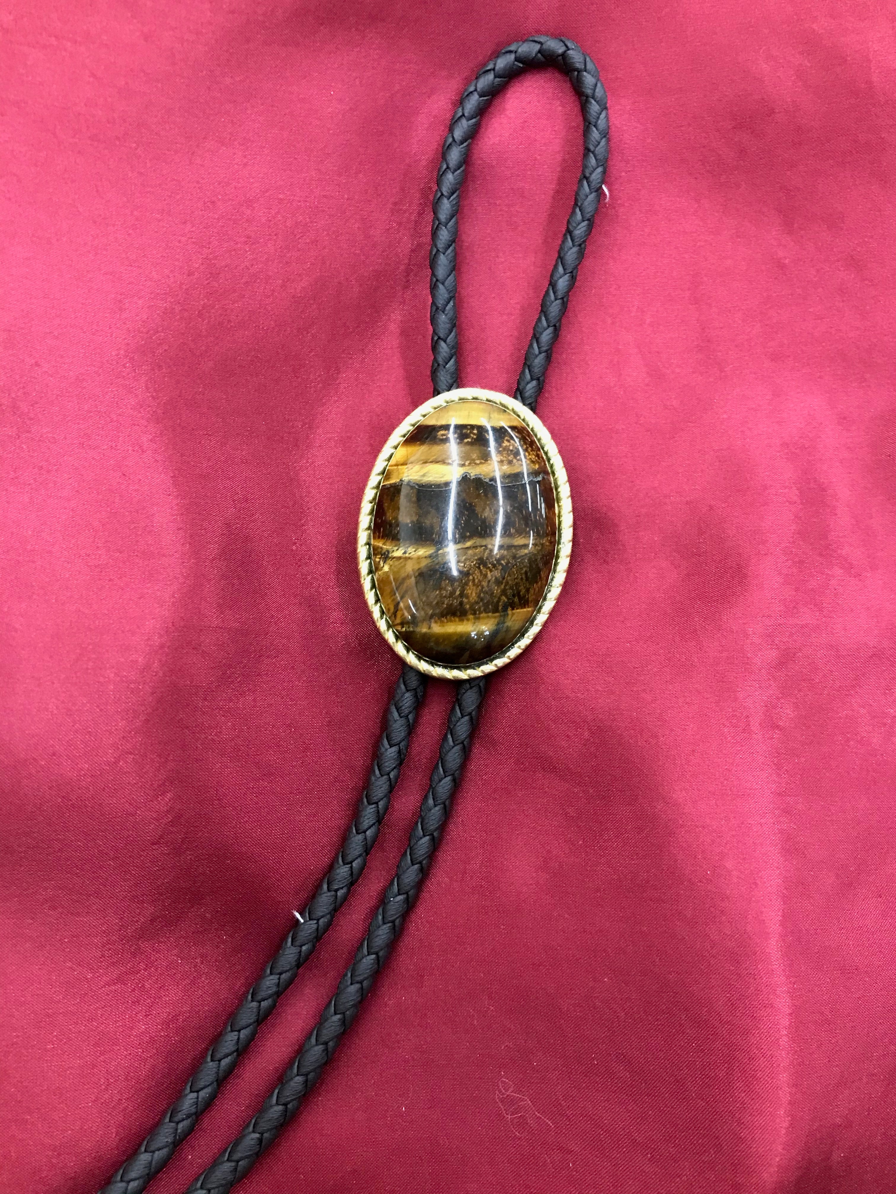 AMBER RESIN BOLO W/ GOLD ROPE TRIM